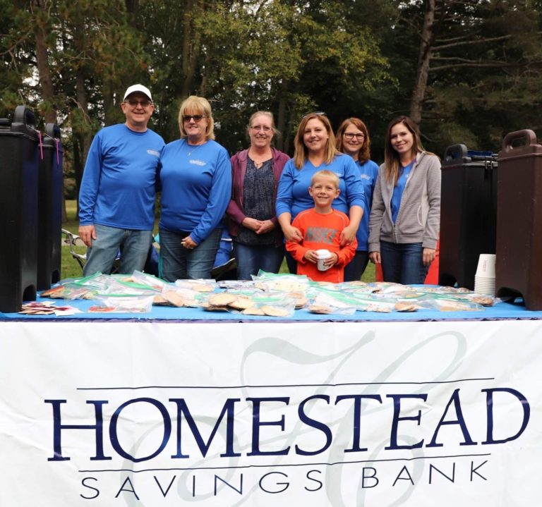 The homestead team manning a booth at the Swingin' At The Shell event